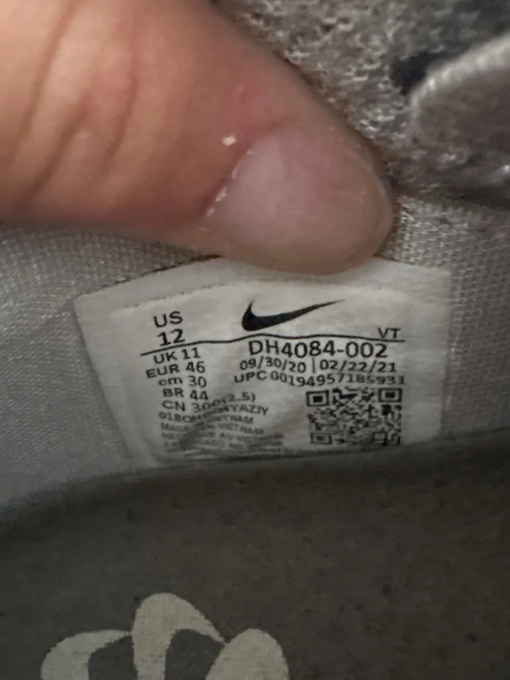 Nike Men’s Light Gray Knit Sneakers with Coral Accents